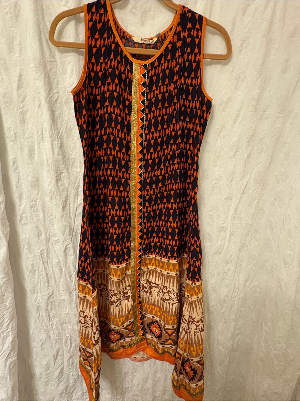 Women’s size medium, global chic tunic, or dress. NWOT.